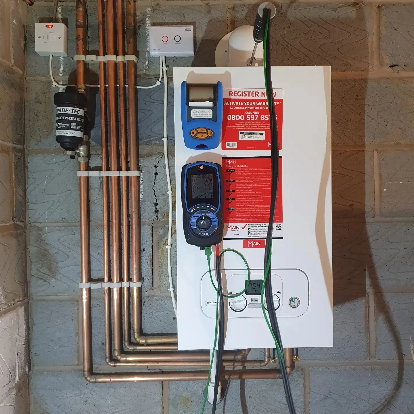 gas boiler in a garage being checked