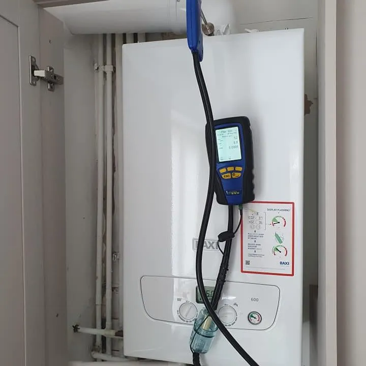 gas boiler being checked for safety